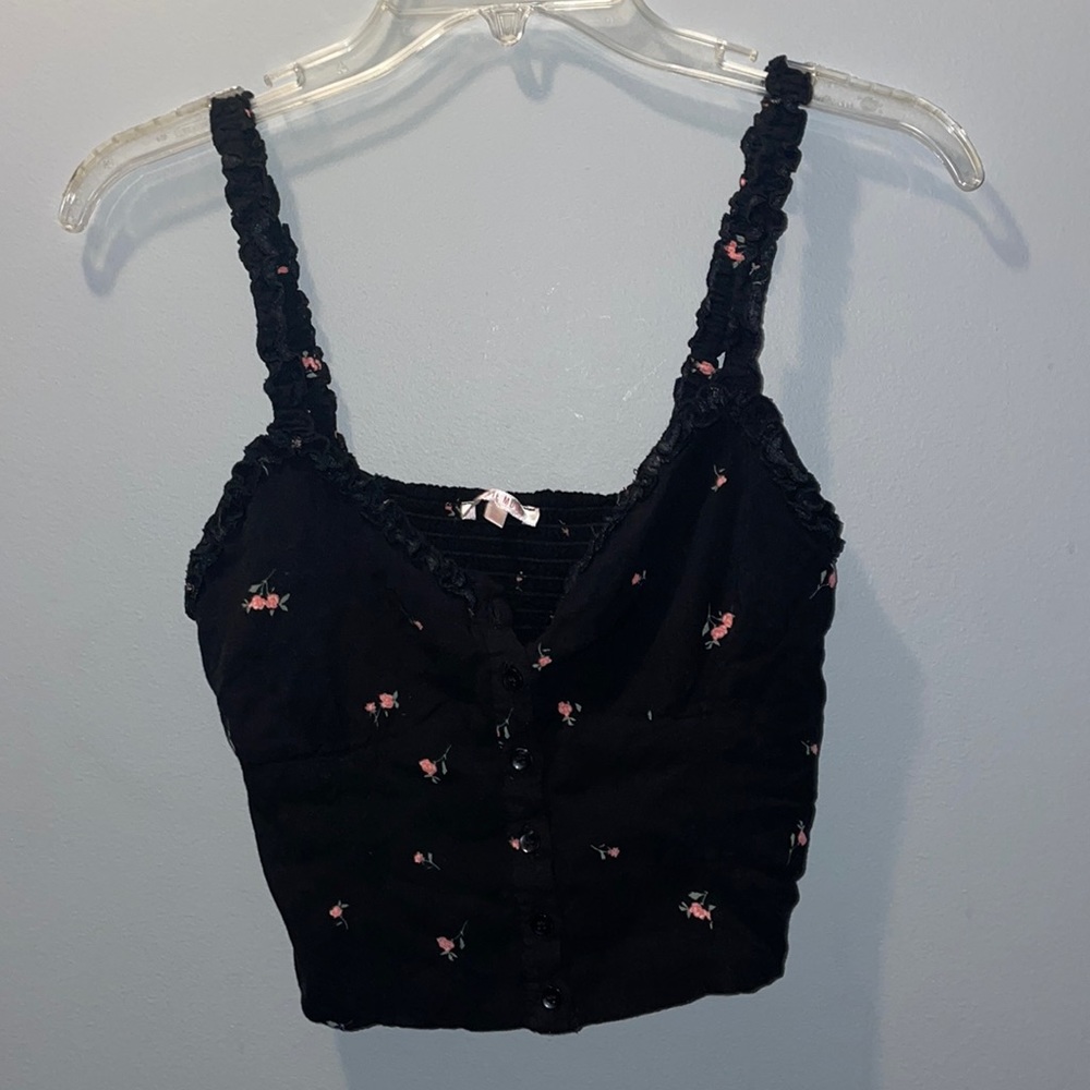 Lottie Moss small black tank top with pink roses.